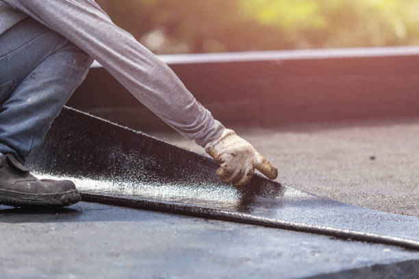 Professional Basement Waterproofing technician working in Saint Elmo, AL